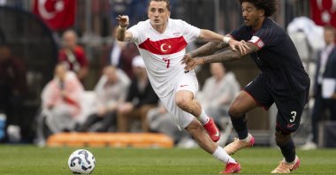 Turkish national team player Kerem Aktürkoğlu (L) gets past USA defender Chris Richards,  in East Hartford, Connecticut, U.S., June 7, 2025. (AA Photo)