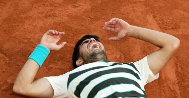 Spain's Carlos Alcaraz celebrates after winning the men's singles final match against Italy's Jannik Sinner on day 15 of the French Open tennis tournament on Court Philippe-Chatrier at the Roland-Garros Complex, Paris, France, June 8, 2025. (AFP Photo)
