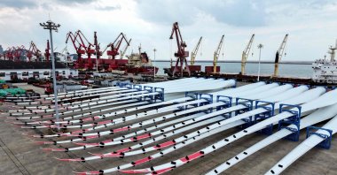 Wind turbine blades waiting to be loaded onto a ship for export at the port in Lianyungang, Jiangsu province, China, May 10, 2025. (AFP Photo)