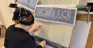 Ayten Aksu, 61, weaves traditional rugs by hand, Nevşehir, Türkiye, June 9, 2025. (AA Photo)