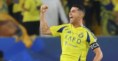Al-Nassr&#039;s Cristiano Ronaldo celebrates scoring his team&#039;s first goal during the Saudi Pro League football match between Al-Nassr and Al-Qadsiah at Al-Awwal Park, Riyadh, Saudi Arabia, Nov. 22, 2024. (AFP Photo)
