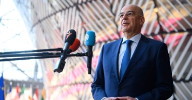 Greek Defense Minister Nikos Dendias makes a statement as he arrives for a Defense Council meeting at the EU headquarters, Brussels, Belgium, May 20, 2025. (AFP Photo)