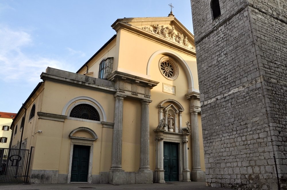 Church of the Assumption of the Blessed Virgin Mary and the Leaning Tower in Rijeka city, Croatia. (Shutterstock Photo)