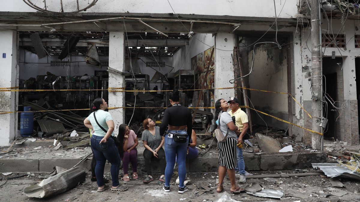 Colombians look at the damage from a car bomb in Corinto, Colombia, June 10, 2025. (EPA Photo)