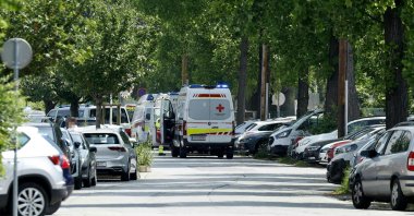Ambulance cars are seen in a street close to a school where, according to reports, several people died in a shooting, Graz, Austria, June 10, 2025. (AFP Photo)