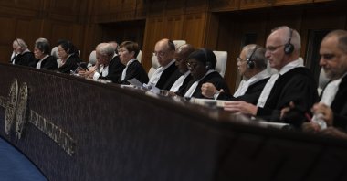 Presiding judge Joan Donoghue (C) opens preliminary hearings in a case at the ICJ as lawyers for Azerbaijan urged the top U.N. court to throw out a case filed by Armenia linked to the Karabakh region, The Hague, Netherlands, Oct. 12, 2023. (AP Photo)