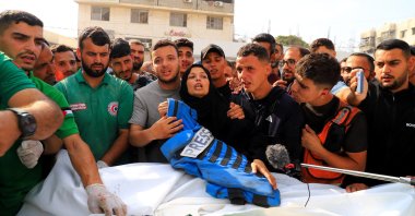 Mourners attend the funeral of a journalist and three Palestinian medics killed in an Israeli airstrike, according to the health ministry, at Al-Shifa hospital, Gaza City, Palestine, June 10, 2025. (Reuters Photo)