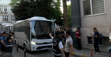 Police officers escort suspects detained in an investigation into corruption at Istanbul municipalities, Istanbul, Türkiye, June 2, 2025. (DHA Photo)