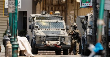 An Israeli soldier takes part in an Israeli raid an Israeli raid in Nablus, the Israeli-occupied West Bank, June 10, 2025. (Reuters Photo)