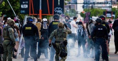 Police use chemical agents to disperse protesters blocking a street while marching against Immigration and Customs Enforcement (ICE), Denver, Colorado, U.S., June 10, 2025. (AFP Photo)