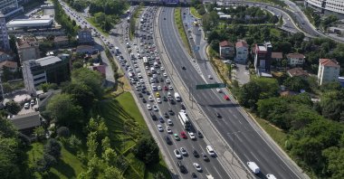 Traffic congestion slows down on the Fatih Sultan Mehmet Bridge near Kavacık on the Anatolian side during the first workday after the Eid al-Adha holiday, Istanbul, Türkiye, June 10, 2025. (AA Photo)