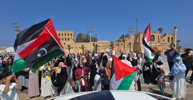 Activists, heading towards Gaza by land with the aim of breaking the siege on the Palestinian territory, are greeted by Libyans, Martyrs Square, Tripoli, Libya, June 11, 2025. (AFP Photo)