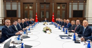 Vice President Cevdet Yılmaz (C) and other officials pose for a photo before the Economic Coordination Board (EKK) meeting in Ankara, Türkiye, June 11, 2025. (AA Photo)