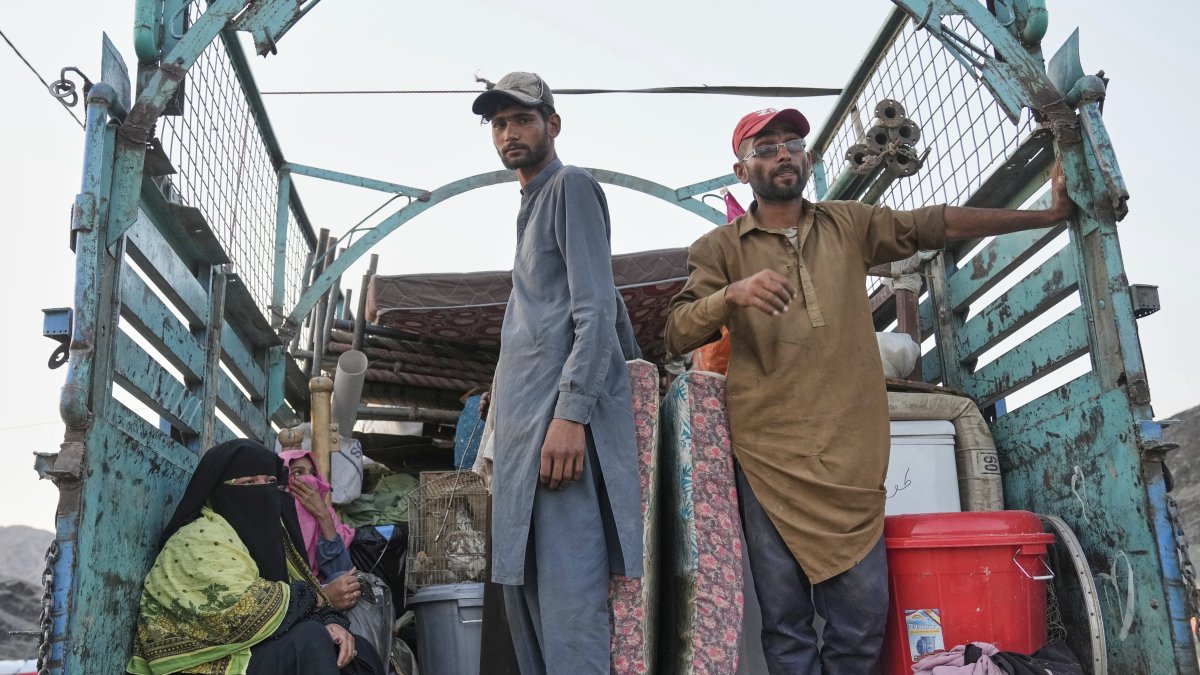 Repatriated Afghan refugees arrive at a camp after crossing the Pakistan-Afghanistan border, Torkham, Afghanistan, May 31, 2025. (AP Photo)
