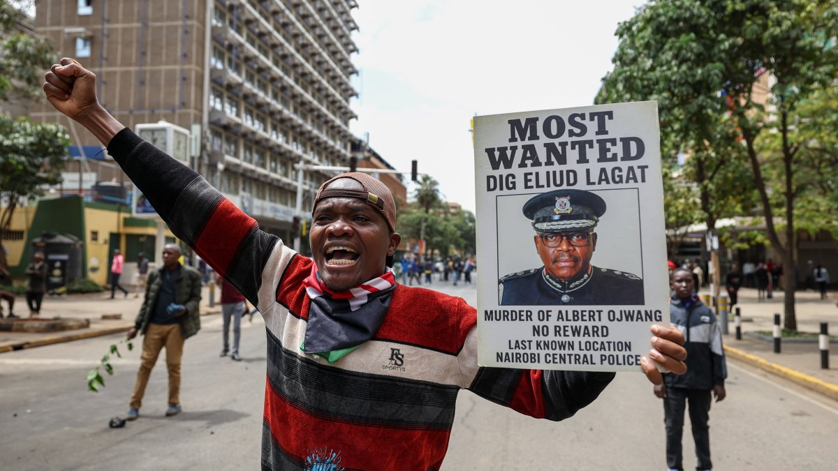 A protester displays a placard during a protest in the central business district, Nairobi, Kenya, June 2025. (EPA Photo)