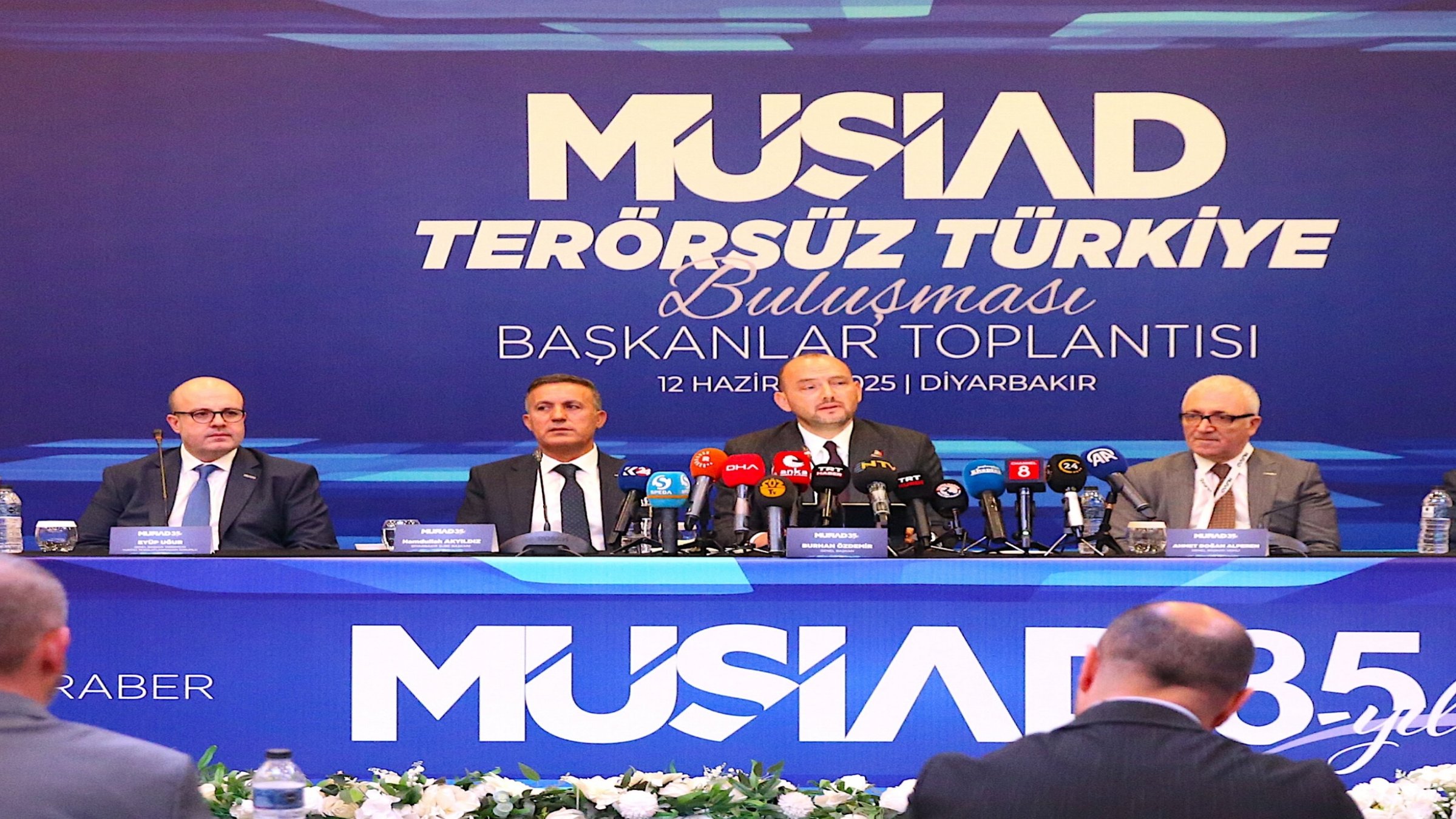 Independent Industrialists and Businessmen&#039;s Association (MÜSIAD) head Burhan Özdemir (C) delivers a speech at the event, Diyarbakır, southeastern Türkiye, June 12, 2025. (AA Photo)