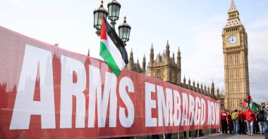 Protesters from the Palestine Solidarity Campaign demonstrate by forming a red line outside the U.K. Parliament, London, Britain, June 4, 2025. (EPA Photo)