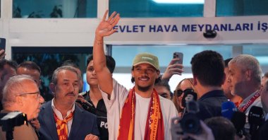 Leroy Sane (C) waves at Galatasaray fans after landing at the Atatürk Airport, Istanbul, Türkiye, June 12, 2025. (AA Photo)