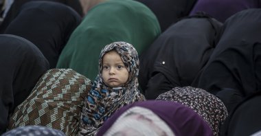 An internally displaced Palestinian girl attends Eid al-Adha prayer, Gaza City, Palestine, June 6, 2025. (EPA Photo)