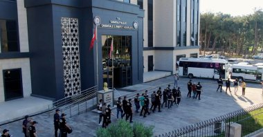 Gang members smuggling migrants are seen arrested by the police in western Çanakkale province, Türkiye, June 11, 2025 (AA Photo)