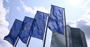 The EU flag flies in front of the European Central Bank (ECB) ahead of a news conference on the eurozone&#039;s monetary policy, Frankfurt, Germany, June 5, 2025. (AFP Photo)