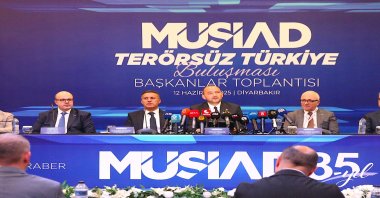 Independent Industrialists and Businessmen's Association (MÜSIAD) head Burhan Özdemir (C) delivers a speech at the event, Diyarbakır, southeastern Türkiye, June 12, 2025. (AA Photo)