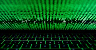 A computer keyboard lit by a displayed cyber code is seen in this illustration picture taken on March 1, 2017. (Reuters File Photo)