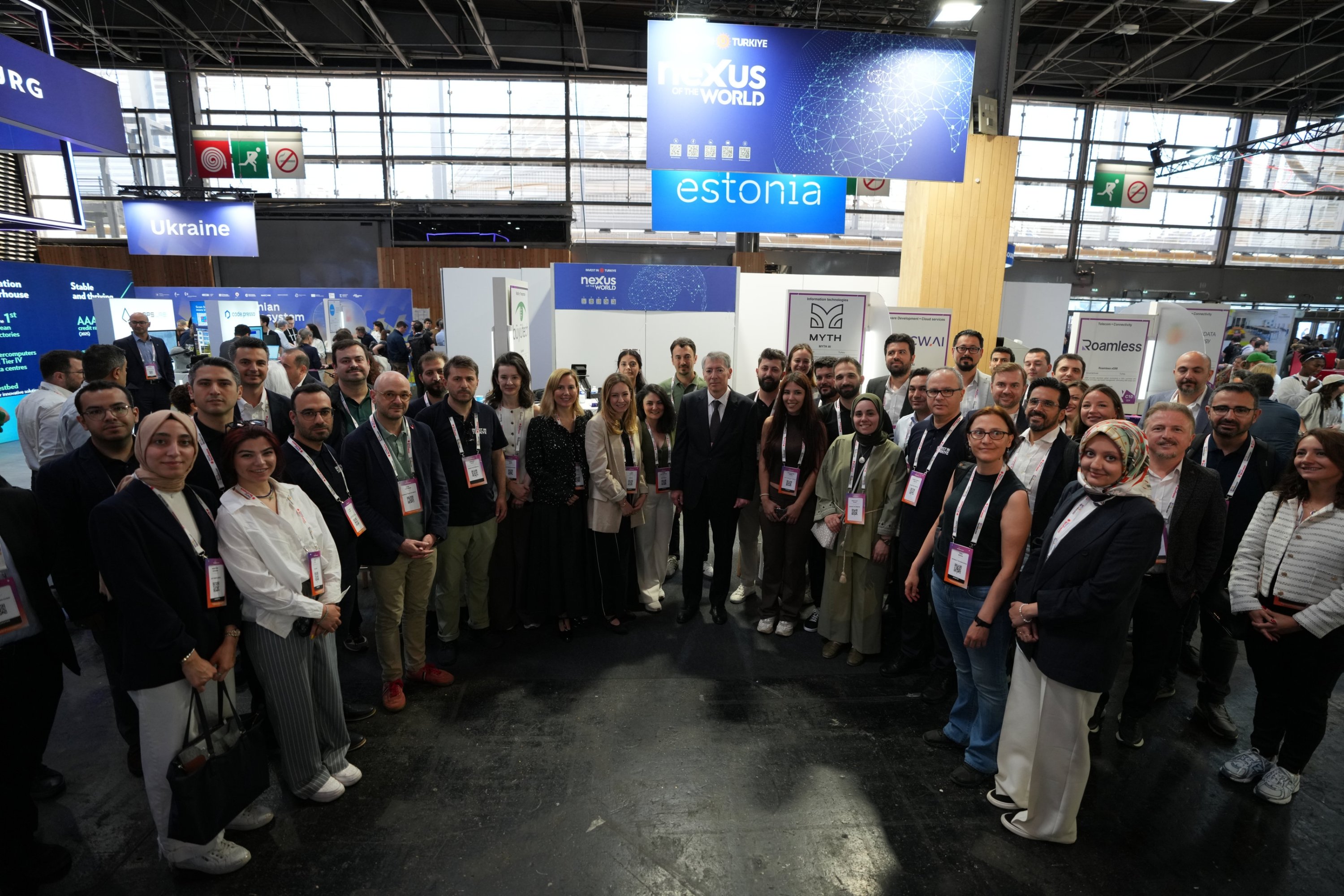 Türkiye's Paris Ambassador Yunus Demirer (C) and members of Turkish startups pose for a photo during the VivaTech technology startups and innovation fair, Paris, France, June 11, 2025. (AA Photo)