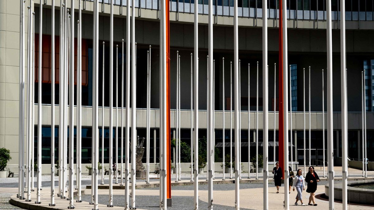 Empty flag poles are seen in a courtyard of the International Atomic Energy Agency (IAEA), June 13, 2025. (AFP Photo)