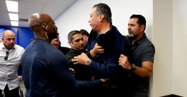 U.S. Senator Alex Padilla (D-CA), who interrupted the press conference held by U.S. Secretary of Homeland Security Kristi Noem, is removed from the venue, in Los Angeles, California, U.S., June 12, 2025. (Reuters Photo)