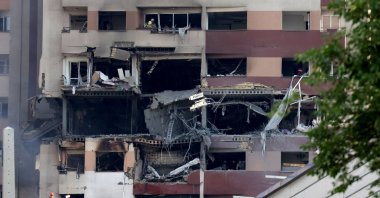 Rescue teams work in a building targeted by an Israeli strike, Tehran, Israel, June 13, 2025. (AFP Photo)
