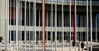 Empty flag poles are seen in a courtyard of the International Atomic Energy Agency (IAEA), June 13, 2025. (AFP Photo)