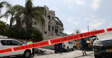 A search and rescue team works behind a cordoned-off area in the town of Tamra, following an overnight retaliatory missile attack by Iran, Israel, June 15, 2025. (AFP Photo)