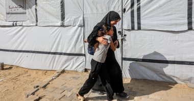 Palestinian mourn a family member killed by Israel near an GHF aid point near Rafah, southern Gaza, June 15, 2025. (AA Photo)