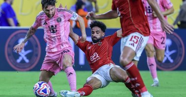 Inter Miami&#039;s Lionel Messi (L) in action against Al Ahly&#039;s Marawan Attia during the FIFA Club World Cup 2025 group stage match in Miami, U.S., June 14, 2025. (EPA Photo)
