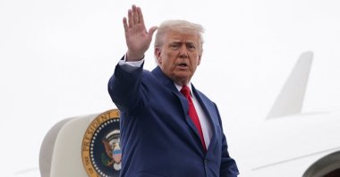 U.S. President Donald Trump waves as he boards Air Force One in Morristown, New Jersey, U.S., June 8, 2025. (Reuters Photo)