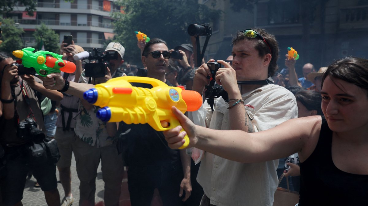 Spaniards squirt visitors as southern Europe pushes back on overtourism