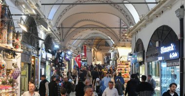 People are seen passing near the stores at the Grand Bazaar, Istanbul, Türkiye, Oct. 23, 2024. (Reuters Photo)