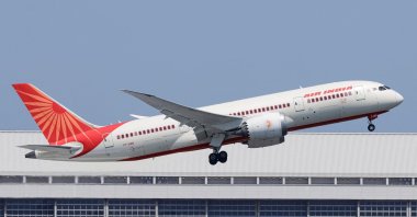 Air India Boeing 787 Dreamliner aircraft with registration letters VT-ANB flies over Tokyo, Japan, April 27, 2025. (Reuters Photo)
