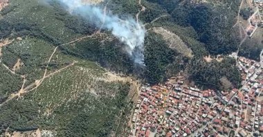 Firefighting efforts continue after two separate forest fires broke out two hours apart in the Soma district of Manisa, Türkiye, June 16, 2025. (DHA Photo)