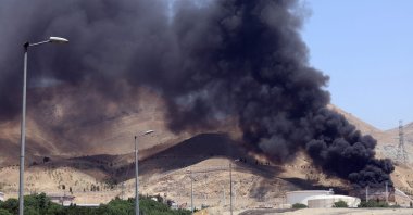 Smoke billows for the second day from the Shahran oil depot, northwest of Tehran, Iran, June 16, 2025. (AFP Photo)
