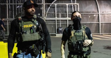 U.S. Immigration and Customs Enforcement (ICE) agents guard outside Delaney Hall, a migrant detention facility, in Newark, New Jersey, U.S., June 12, 2025. (AFP Photo)