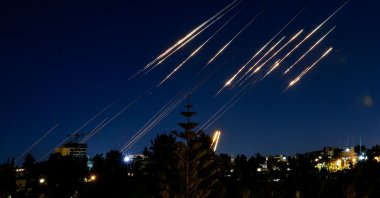 Missiles fired from Iran are pictured in the night sky over Jerusalem, Israel, June 14, 2025. (AFP Photo)