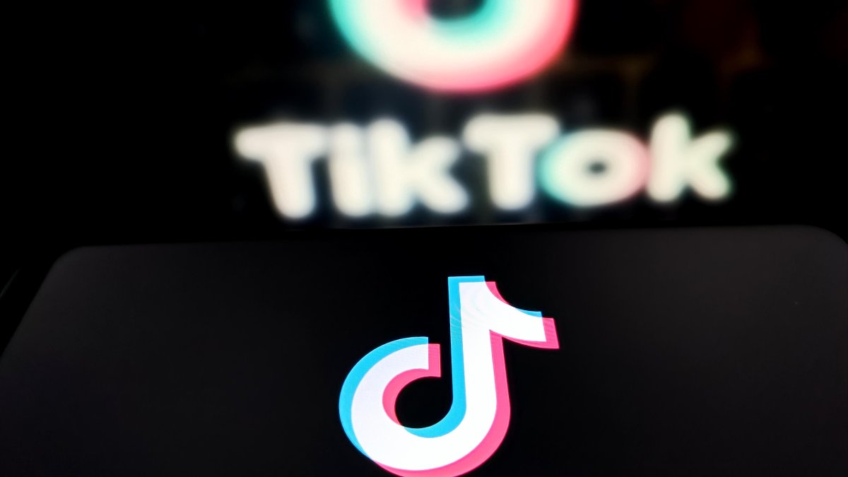 An illustration photo shows the TikTok logo displayed on a smartphone in Suqian City, Jiangsu Province, China, June 10, 2025. (Reuters Photo)