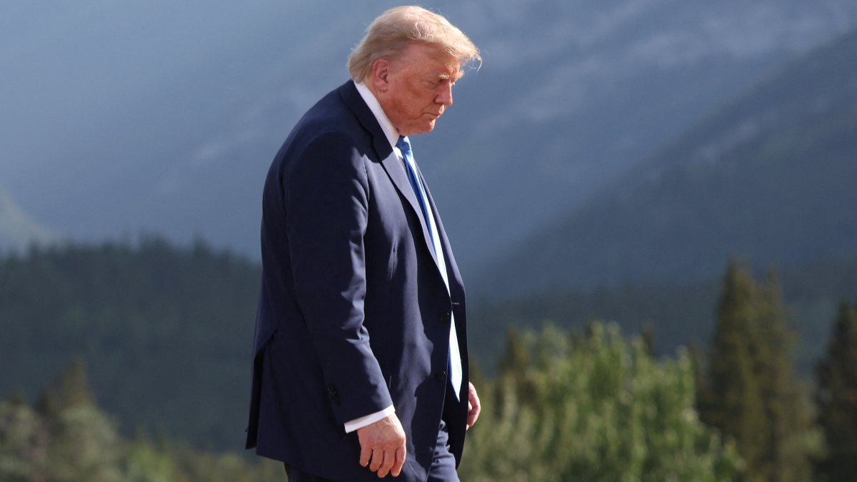 US President Donald Trump departs after a family photo during the G-7 Summit in Kananaskis, Alberta, Canada, June 16, 2025. (EPA Photo)