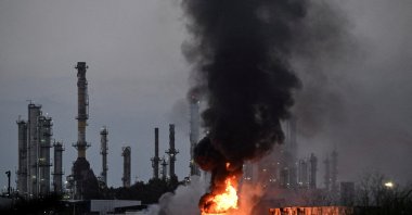 Smoke and fire rise at an impacted facility site following a missile attack from Iran, Haifa, Israel, June 15, 2025. (Reuters Photo)