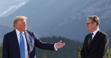 U.S. President Donald Trump and British Prime Minister Keir Starmer attend a family photo session during the G-7 Summit, in Kananaskis, Alberta, Canada, June 16, 2025. (Reuters Photo)