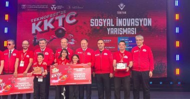 Students from a science and art center in northern Samsun province pose next to officials as they receive an award during Teknofest, Lefkoşa (Nicosia), TRNC, May 4, 2025. (IHA Photo)