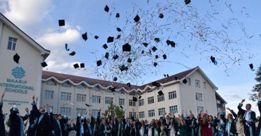 Students throw their caps during a graduation ceremony held for seventh-term students at a Turkish Maarif Foundation school, Tetovo, Macedonia, May 22, 2025. (AA Photo)