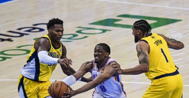 Oklahoma City Thunder forward Jalen Williams (C) shoots against Indiana Pacers forward Obi Toppin (R) during the second half of game five of the NBA finals between the Oklahoma City Thunder and the Indiana Pacers, Oklahoma City, U.S., June 16, 2025. (EPA Photo)